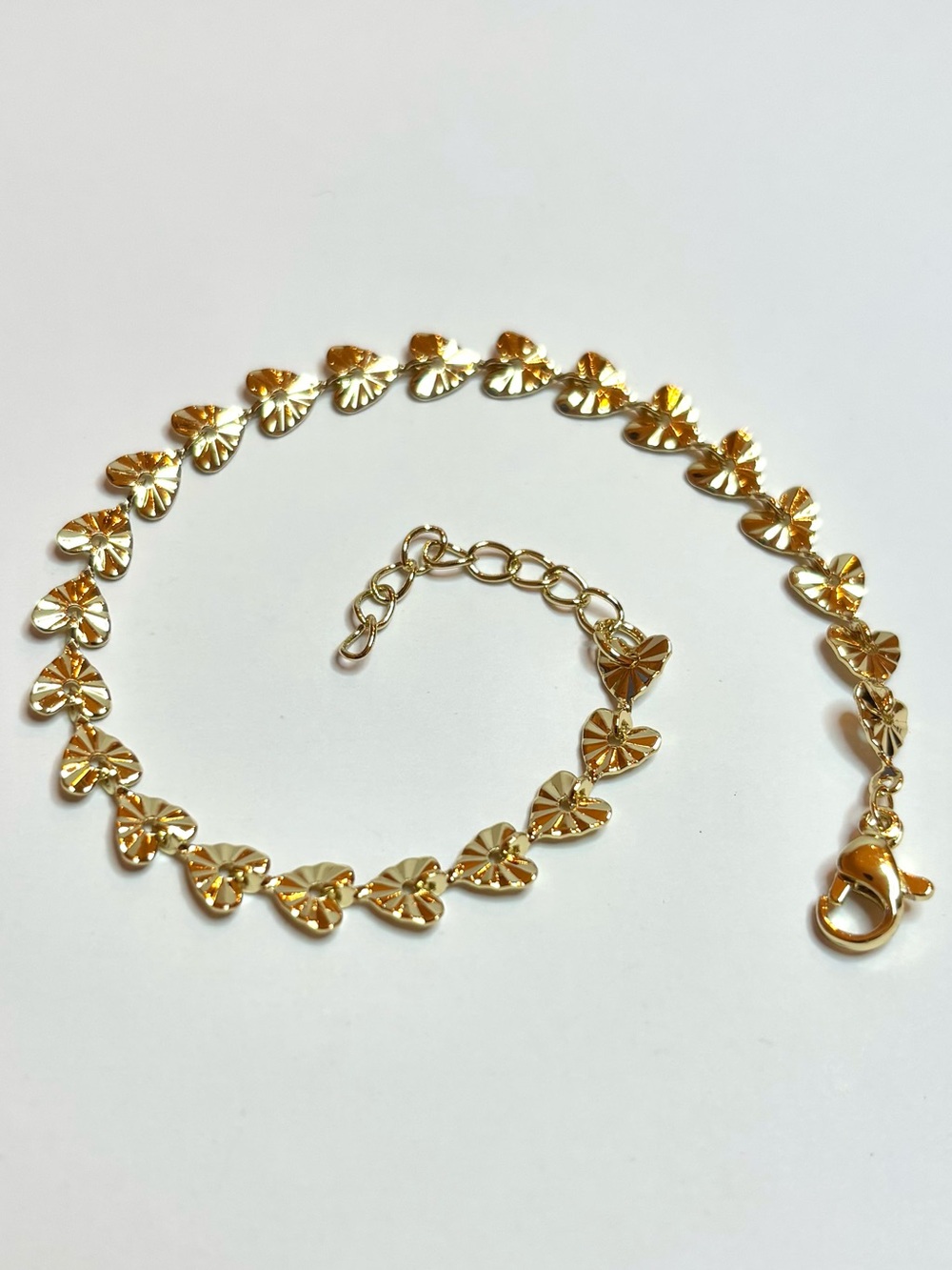 Gold diamond cut heart bracelet